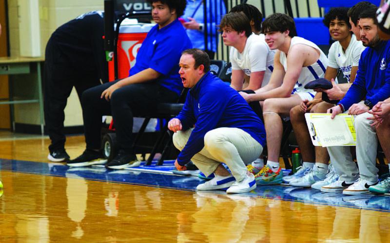 HUNTER KING | DISPATCH RECORD Head coach Aaron Nuckles instructs his team from the sideline.