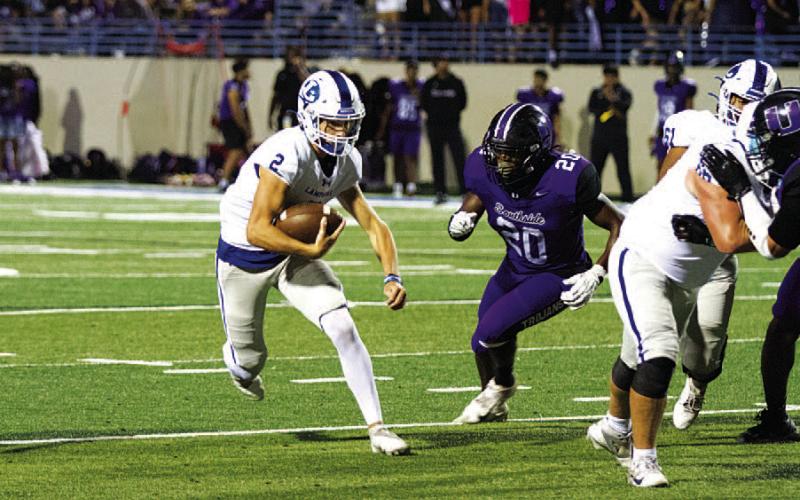 HUNTER KING | DISPATCH RECORD Bryson Roberts played the second half at quarterback and nearly led the Badgers to a win.