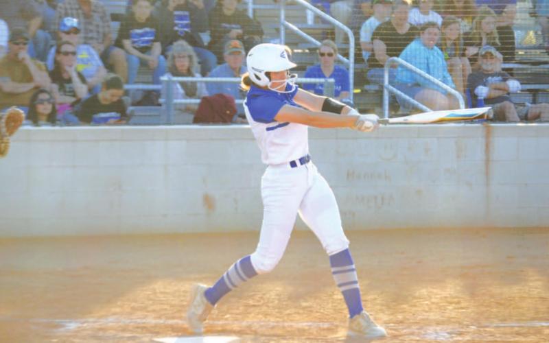 Hannah Perry follows through on a swing that sent the ball over the fence for her first home run of the game against Glen Rose last Friday. HUNTER KING | DISPATCH RECORD