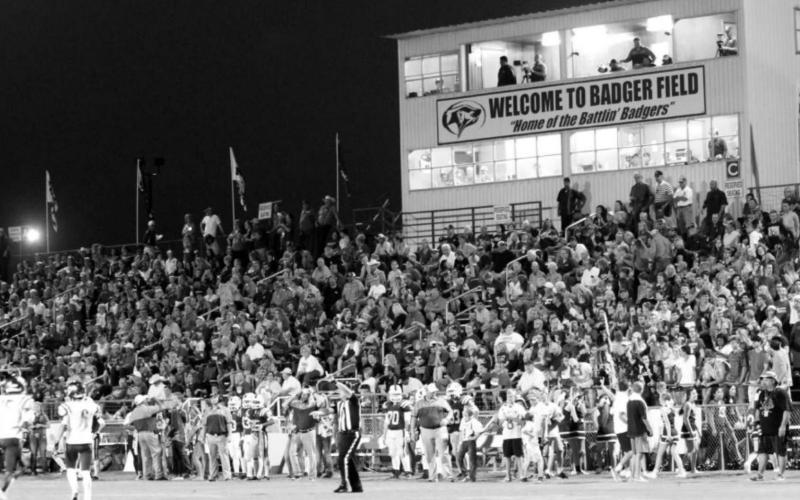 A large crowd enjoys a football game at Badger Field. If House Bill 547 passes this legislative session, homeschool students could be allowed to participate in UIL activities such as football. FILE PHOTO