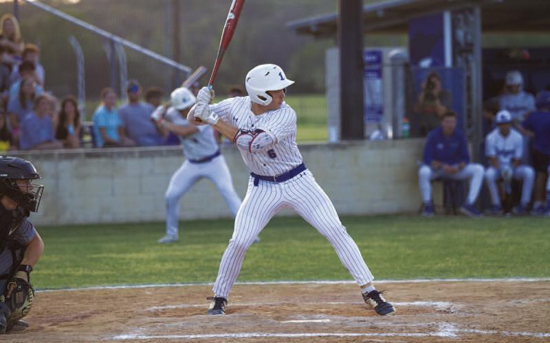 Brayden McLoughlin awaits a pitch during the home win. HUNTER KING | DISPATCH RECORD