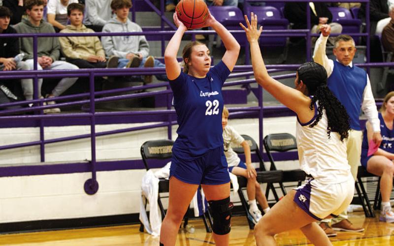 Kenedi Smart looks to pass to a teammate as head coach Marcus Chapa watches. HUNTER KING | DISPATCH RECORD