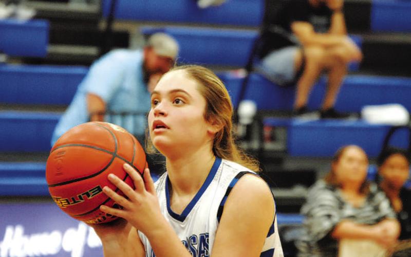 Morgan Bobo prepares to shoot a free throw during the win over Rouse. HUNTER KING | DISPATCH RECORD