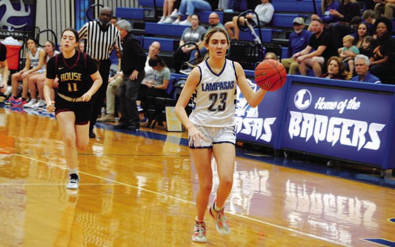 Payton Tatum dribbles to the basket for a layup after one of her 16 steals in last Friday’s game. HUNTER KING | DISPATCH RECORD