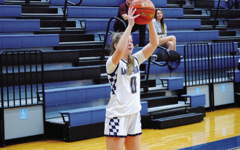Addison Borchardt looks for a passing option in the first half. HUNTER KING | DISPATCH RECORD