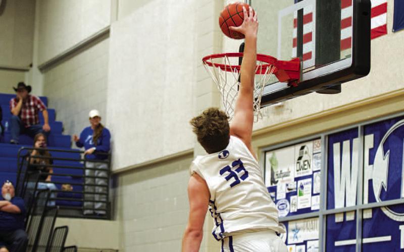 HUNTER KING | DISPATCH RECORD Beau Patterson throws down a dunk in Tuesday’s contest.