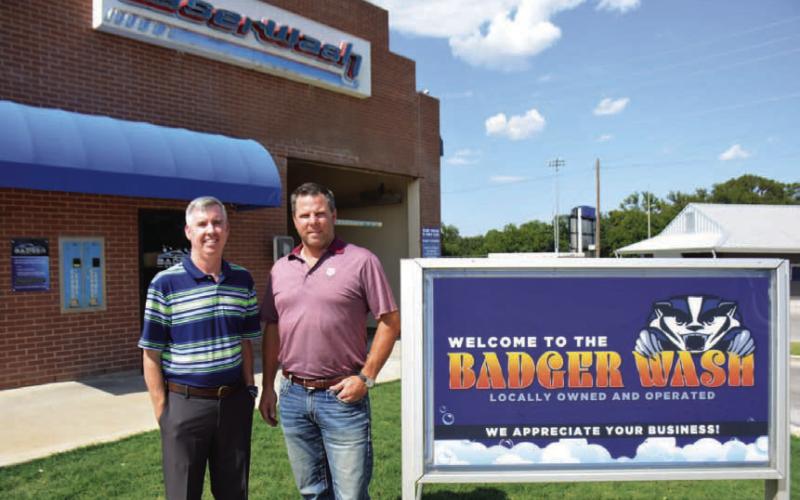 William McAnelly, left, and Jim Collins purchased Badger Car Wash last February. The business consists of a four-bay, self-serve car wash and a state-of-the-art automatic bay. COURTESY PHOTO