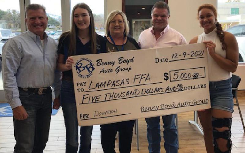 Donation to benefit Lampasas FFA The Benny Boyd CDJR dealership recently presented a $5,000 check to Lampasas FFA. Pictured, left to right, are Jamie Erickson, head of community relations for the auto dealership; Bryli Wilson, Lampasas FFA president; Judy Hail, FFA adviser; dealership owner Benny Boyd; and Juliana Dwamena, Lampasas FFA vice president. COURTESY PHOTO