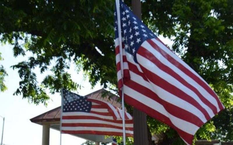 The Kiwanis Club will place an American flag outside each business sponsor for observances such as Veterans Day and Fourth of July. The fundraiser will benefit local youth. file photo