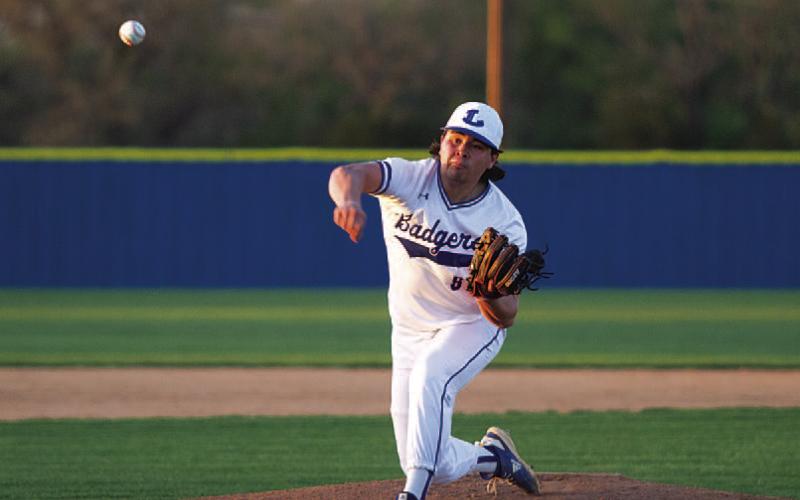 HUNTER KING | DISPATCH RECORD Tak Stinnett releases a pitch early in the Badgers’ win over Georgetown Gateway last Friday.