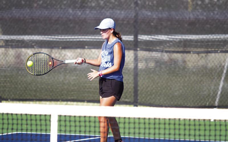Caroline White is a leader for the girls’ tennis team in her junior season. FILE PHOTO