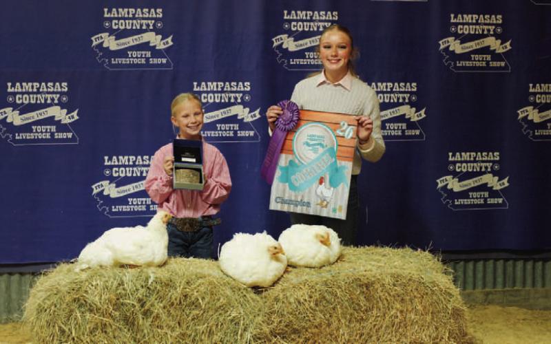 Tynlie Turner exhibited the grand champion market cockerel, the champion roaster and the reserve champion pullet. ADAM BARRIOS | DISPATCH RECORD