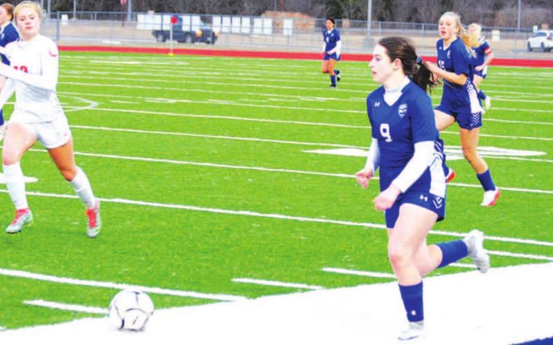 Bella Lindsey runs down the left wing against Lake Belton at home. FILE PHOTO
