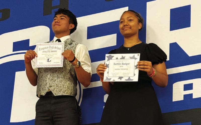 COURTESY PHOTO Juan Rodriguez, left, and Kaira Toeaina were the Battlin’ Badger award winners.