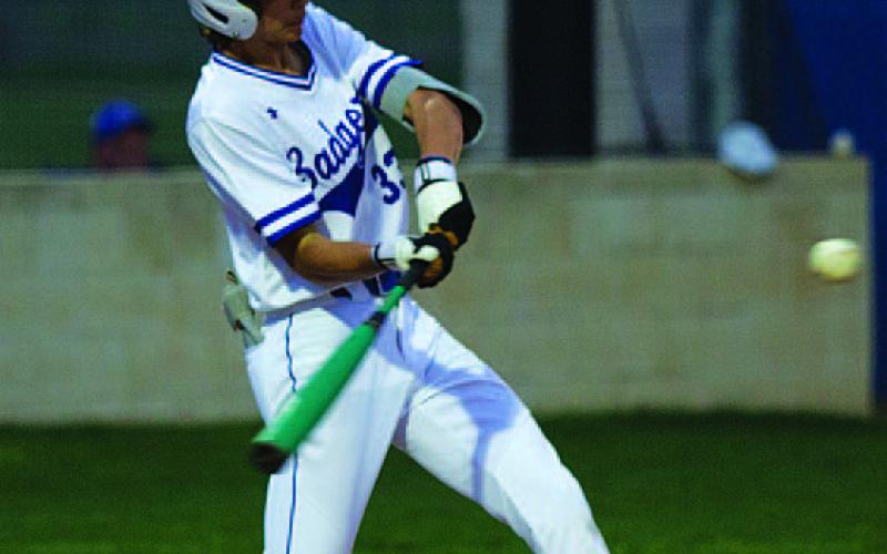 Jackson Wright swings at a pitch in last Thursday’s game. HUNTER KING | DISPATCH RECORD
