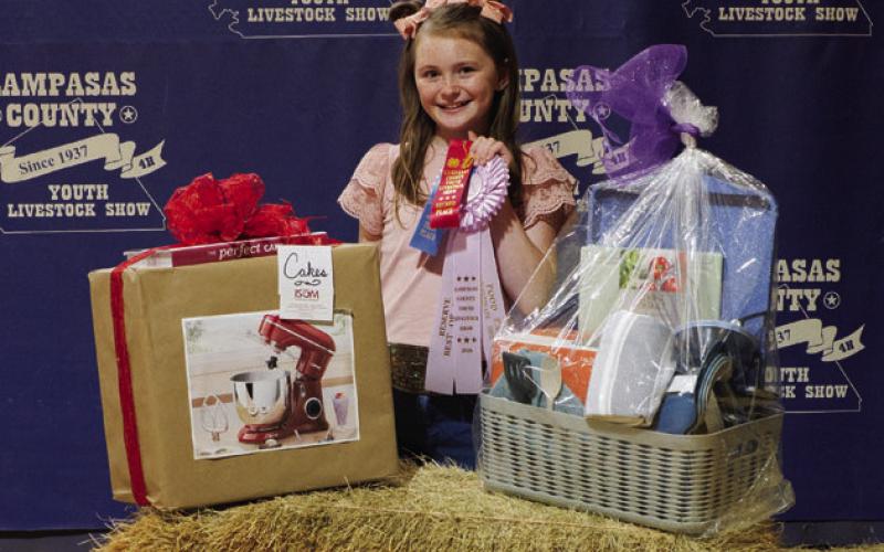 Reserve champion in the junior division of the 2026 Food Fair was Kylee Davis. Her cake entry earned her this prize package. ADAM BARRIOS | DISPATCH RECORD