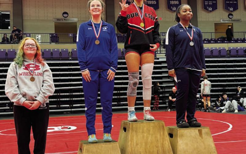 Jordan Winfree poses for a photo with her third-place medal from the district tournament. COURTESY PHOTO