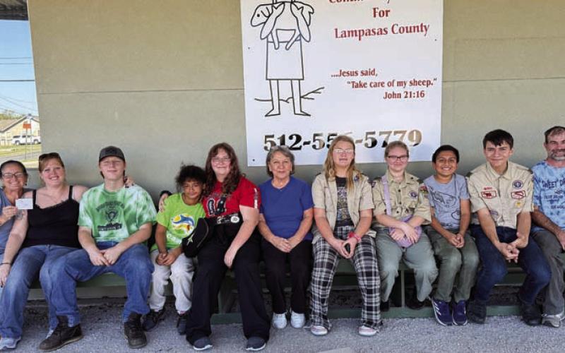 This group of Scouts and helpers delivered 1,370 pounds of non-perishable foodstuffs to Lampasas Mission as part of a recent community service food drive. COURTESY PHOTO | MARY RARING HART
