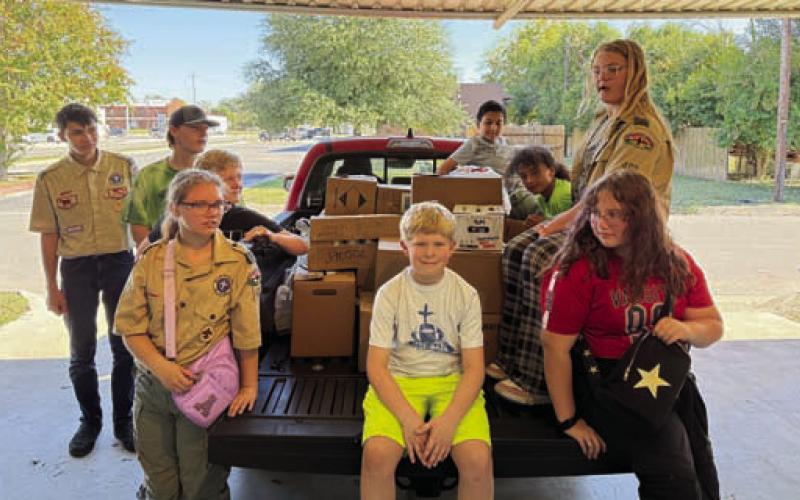 Members of Scout Troops 200/400 collected and organized nonperishable food items from several Lampasas neighborhoods and then delivered the donations to Lampasas Mission. COURTESY PHOTO | MARY RARING HART