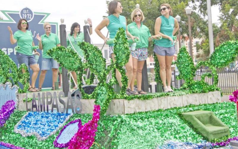 Although the Spring Ho Grand Parade was canceled in 2020, the committee still had a festive float that several members rode for a quick trip around downtown. COURTESY PHOTO