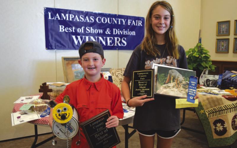 Braxton Swinford, left, won Overall Best of Show Junior Division with a sculpture of a dog made from tin and metal cuttings. Brynn Crawford, right, won Overall Reserve Best of Show Junior Division with her photograph of a wild fox. ALEXANDRIA RANDOLPH | LAMPASAS DISPATCH RECORD