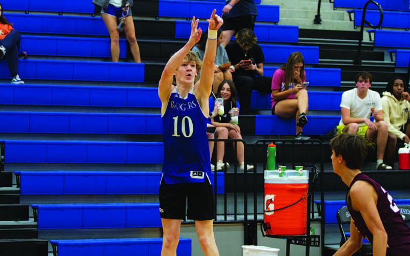 Peyton Sisson shoots a three over a Brownwood defender during Tuesday’s scrimmages. HUNTER KING | DISPATCH RECORD