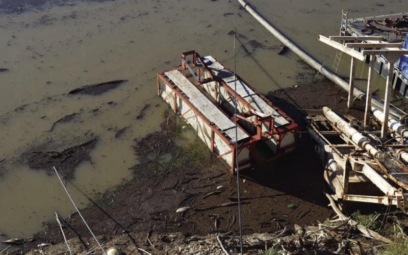 ERICK MITCHELL | DISPATCH RECORD Visible are two black wires being fed into the water. Those wires provide energy to the Central Texas Water Supply’s lower intake pumps. Both pumps have been active since heavy rainfall was recorded in late October.