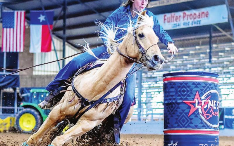 Victoria Procter rounds a barrel at a rodeo with her mare, Bunny. The two of them will run together at the college finals. COURTESY PHOTO