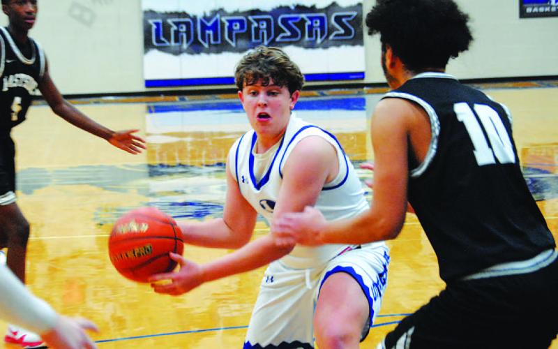 Aidan Nuckles scored 20 points in his high school basketball debut last week. HUNTER KING | DISPATCH RECORD