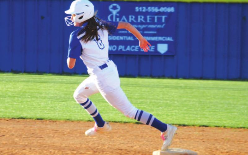 Kayli Syx rounds second and heads for third during the Lady Badgers’ game against Gatesville last Friday HUNTER KING | DISPATCH RECORD