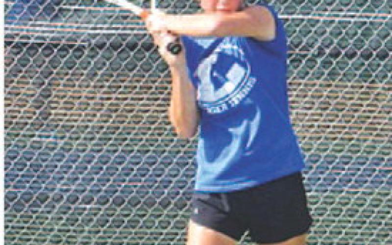 COURTESY PHOTO | KENNETH PEISER Allison Valdez swings through a backhand shot.