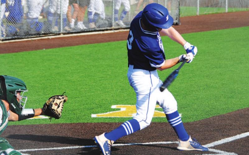 Carson Bekker swings at a pitch during the first game against Iowa Park in Stephenville on Saturday. HUNTER KING | DISPATCH RECORD