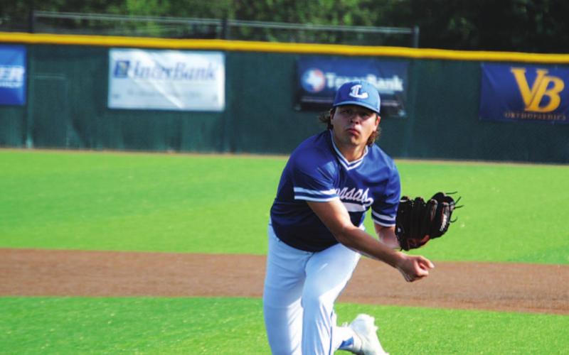 Tak Stinnett releases a breaking ball during his complete game outing to win the first game. HUNTER KING | DISPATCH RECORD
