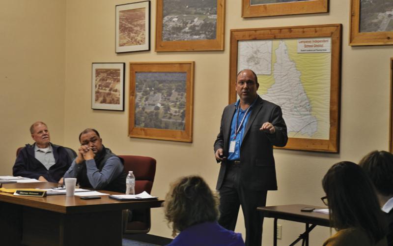 ERICK MITCHELL | DISPATCH RECORD Lampasas High School Principal Paul Weinheimer provides a campus update to LISD school board members during last week’s regular meeting.