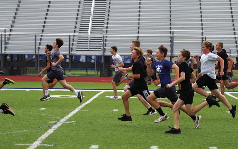 Middle school athletes are back at the high school this week for summer workouts. HUNTER KING | DISPATCH RECORD