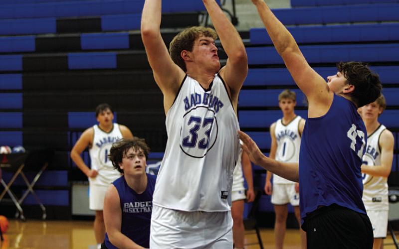 Beau Patterson shoots over an outstretched defender during a recent practice. HUNTER KING | DISPATCH RECORD