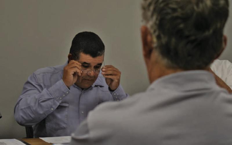Lampasas Central Appraisal District board member Chris Harrison reviews figures presented in the proposed budget for 2025. LCAD directors discussed the detailed proposal at their meeting last week and ultimately trimmed some requests to make the budget more acceptable to the taxing entities in its jurisdiction. ERICK MITCHELL | DISPATCH RECORD
