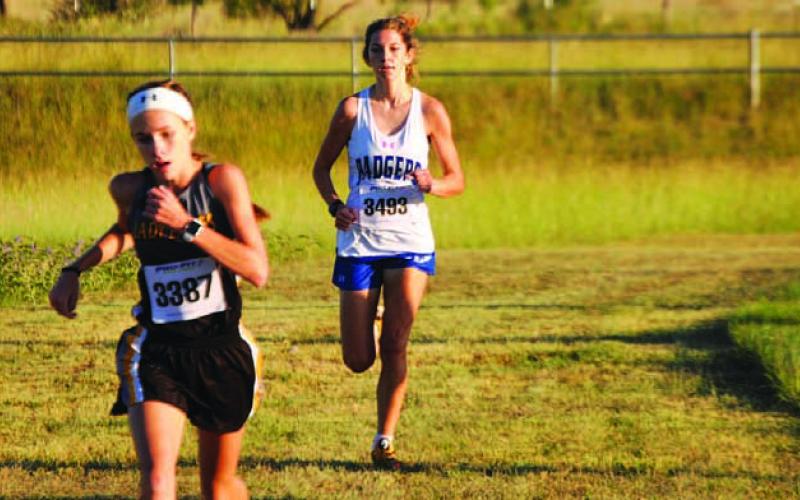 Nyla Long runs down the final stretch to finish third at the 580 Sports Complex. HUNTER KING | DISPATCH RECORD