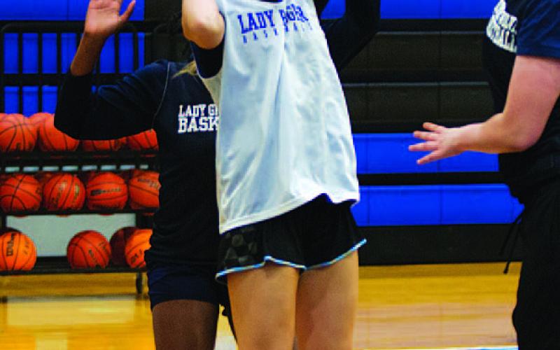 HUNTER KING | DISPATCH RECORD Mia Mulcahy shoots over an outstretched defender.