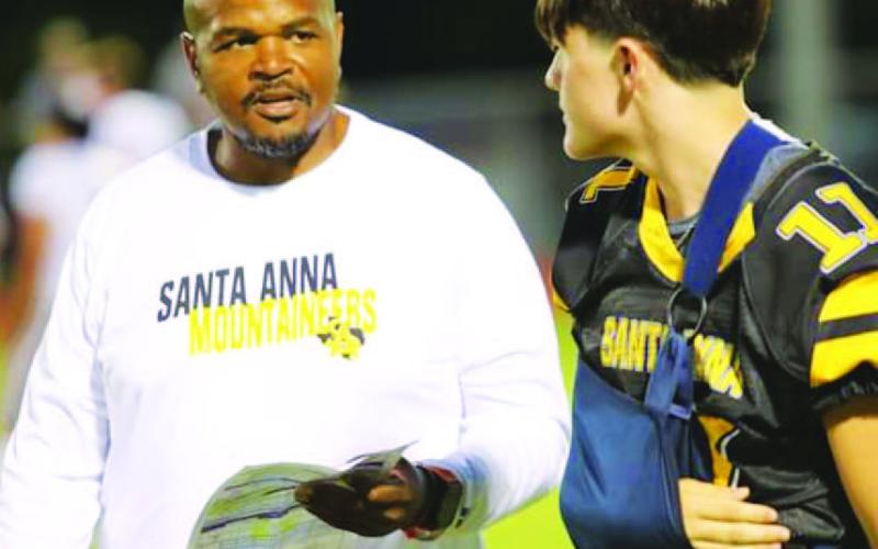 COURTESY PHOTO Terrance Wadley talks with one of his players from Santa Anna.