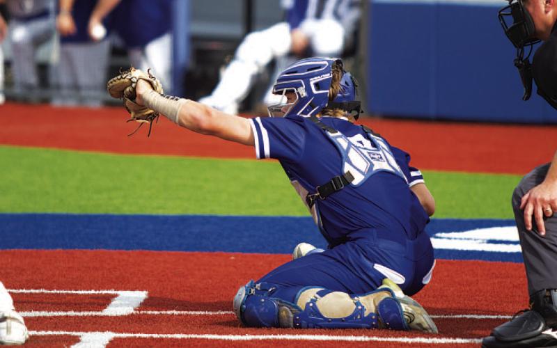 Corbin Kepler frames a pitch for strike three. HUNTER KING | DISPATCH RECORD