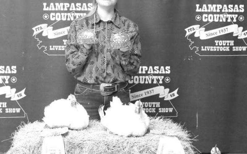 MASON HINES | DISPATCH RECORD Brice Miller showed the reserve champion cockerel as well as the reserve champion market pullet at this year’s show.