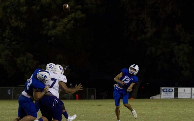 Dylan Sanchez launches a ball deep to Ethan Moreno in the second quarter of the Badgers’ win. HUNTER KING | DISPATCH RECORD
