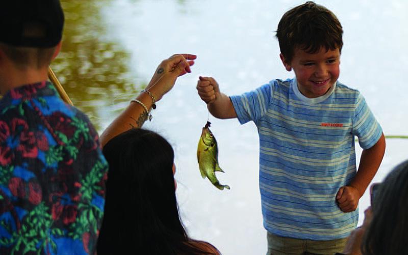 Children ages 5-12 can have a blast angling with cane poles at the Kiddie Fishing Derby. The event takes place Wednesday from 8-10 a.m. at W.M. Brook Park. Poles are provided, and assistance is offered for those who need it. FILE PHOTO