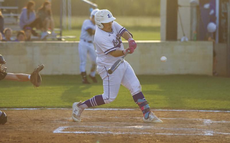 Benny Rodriguez swings at a pitch during Tuesday’s game. He ripped a single into left field. HUNTER KING | DISPATCH RECORD