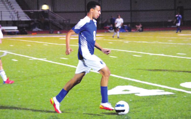 Tyler Grant dribbles up the right wing side during the Badgers’ match against Gatesville last Friday. HUNTER KING | DISPATCH RECORD