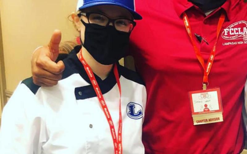Hannah Gessner is shown with Lampasas High School FCCLA adviser Jason Walsh at the state competition in Dallas, where Gessner took second place in the Mystery Basket competition. COURTESY PHOTO