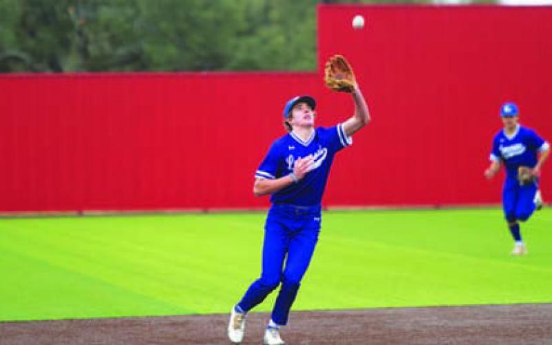 Owen Stubbs catches a pop fly in the Salado tournament. HUNTER KING | DISPATCH RECORD