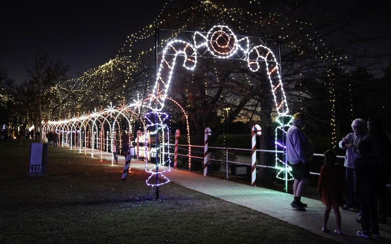 Candy Cane Lane in W.M. Brook Park will remain lighted over the holidays for those who stroll along Sulphur Creek. ADAM BARRIOS | DISPATCH RECORD