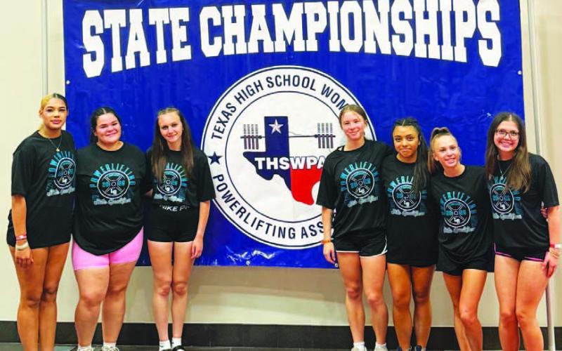 FILE PHOTO Girls’ powerlifting sent all of these athletes to the state powerlifting meet.